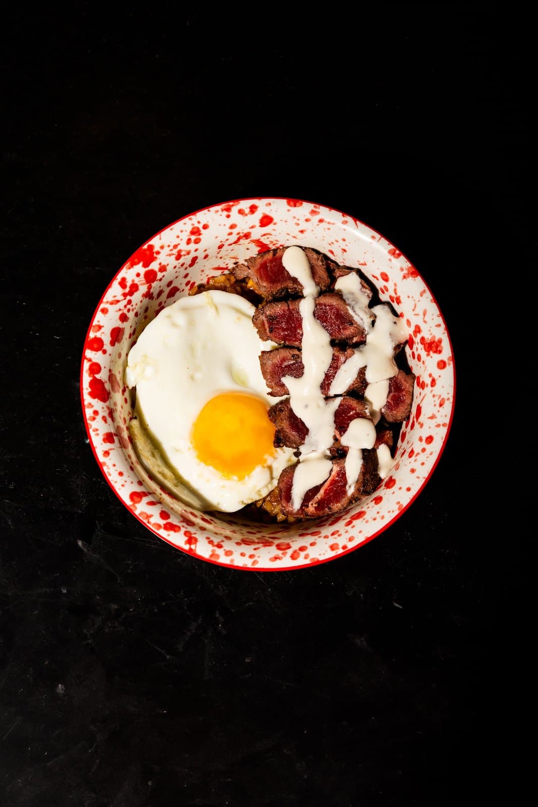 Steak rice with egg.