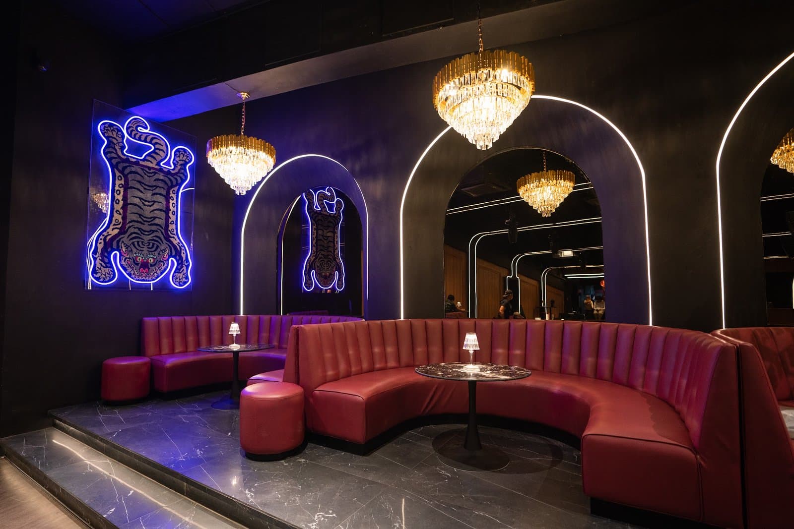 Seating along the mirrored wall.